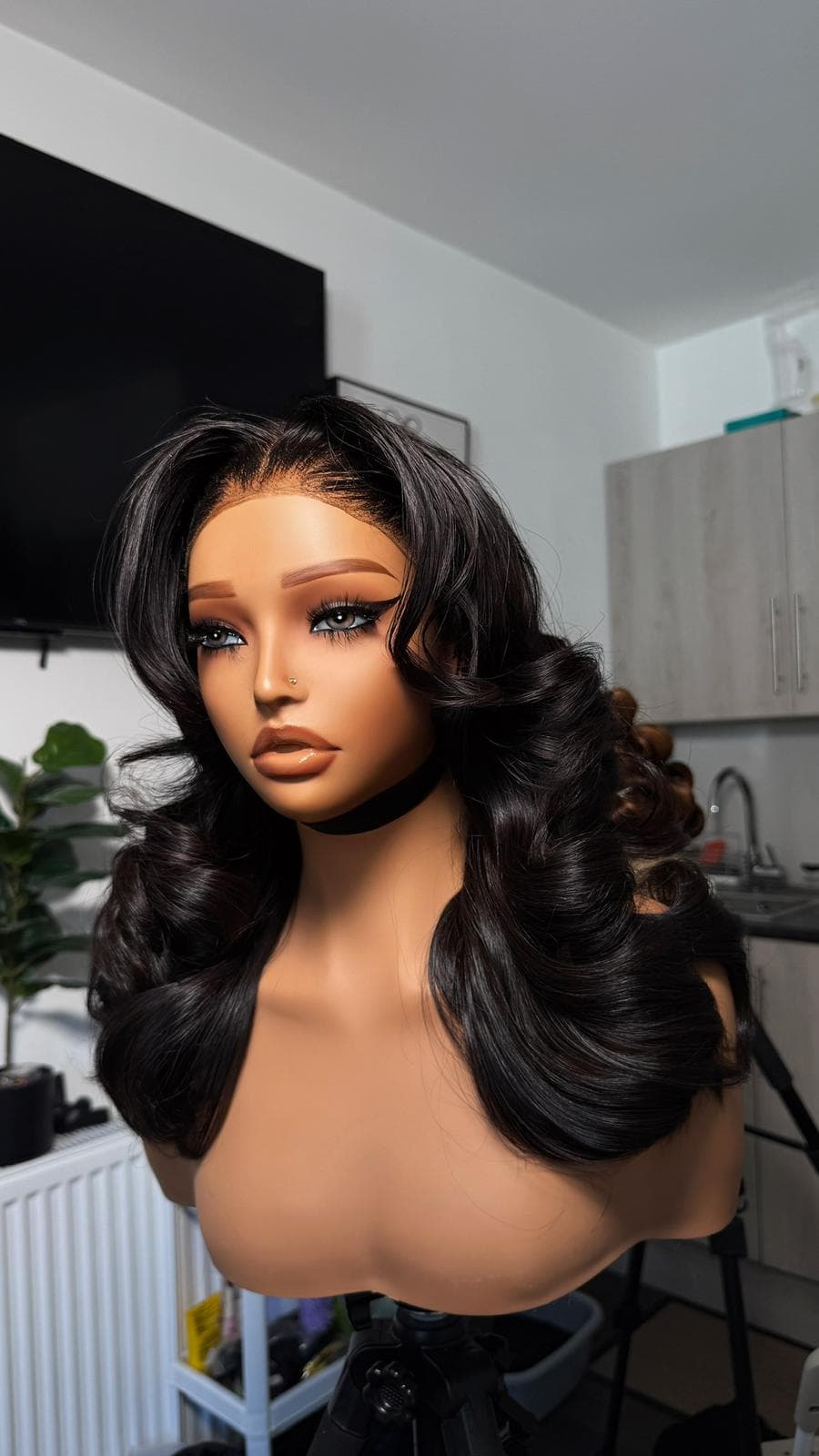 Curly wig set on roller pins